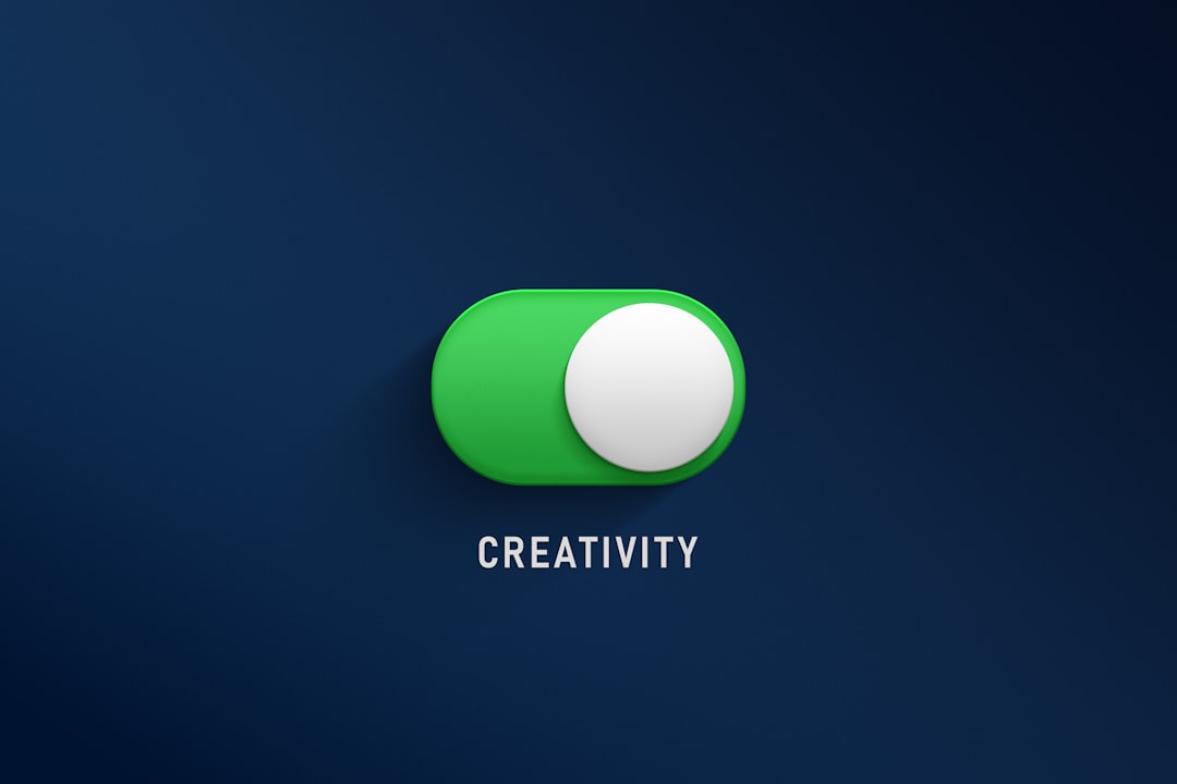 a-green-button-with-the-word-creativity-on-it-ih3hiotsm28